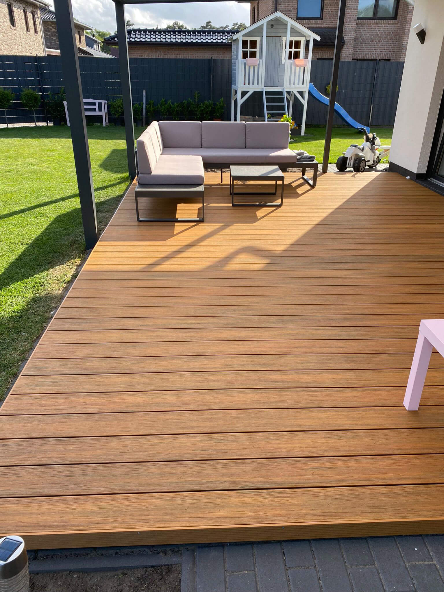 Gedeckte Terrasse - WPC Terrassendielen Premium Amber