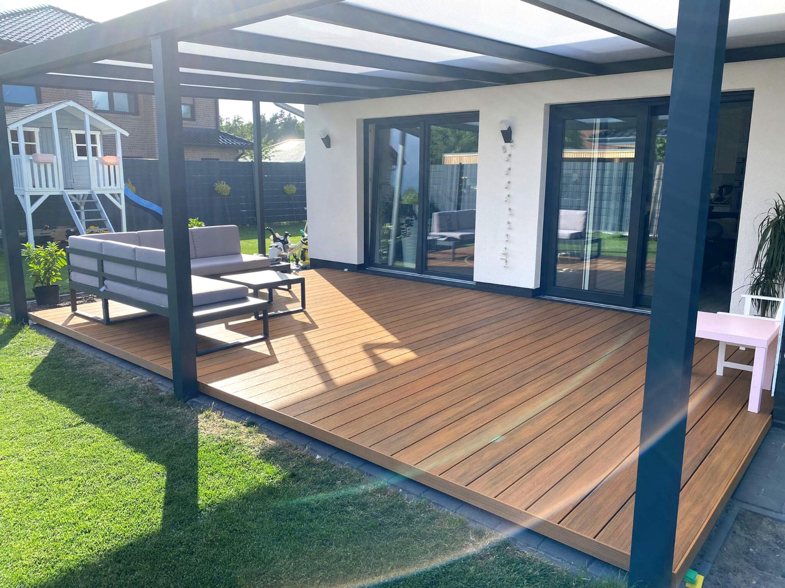 Gedeckte Terrasse - WPC Terrassendielen Premium Amber