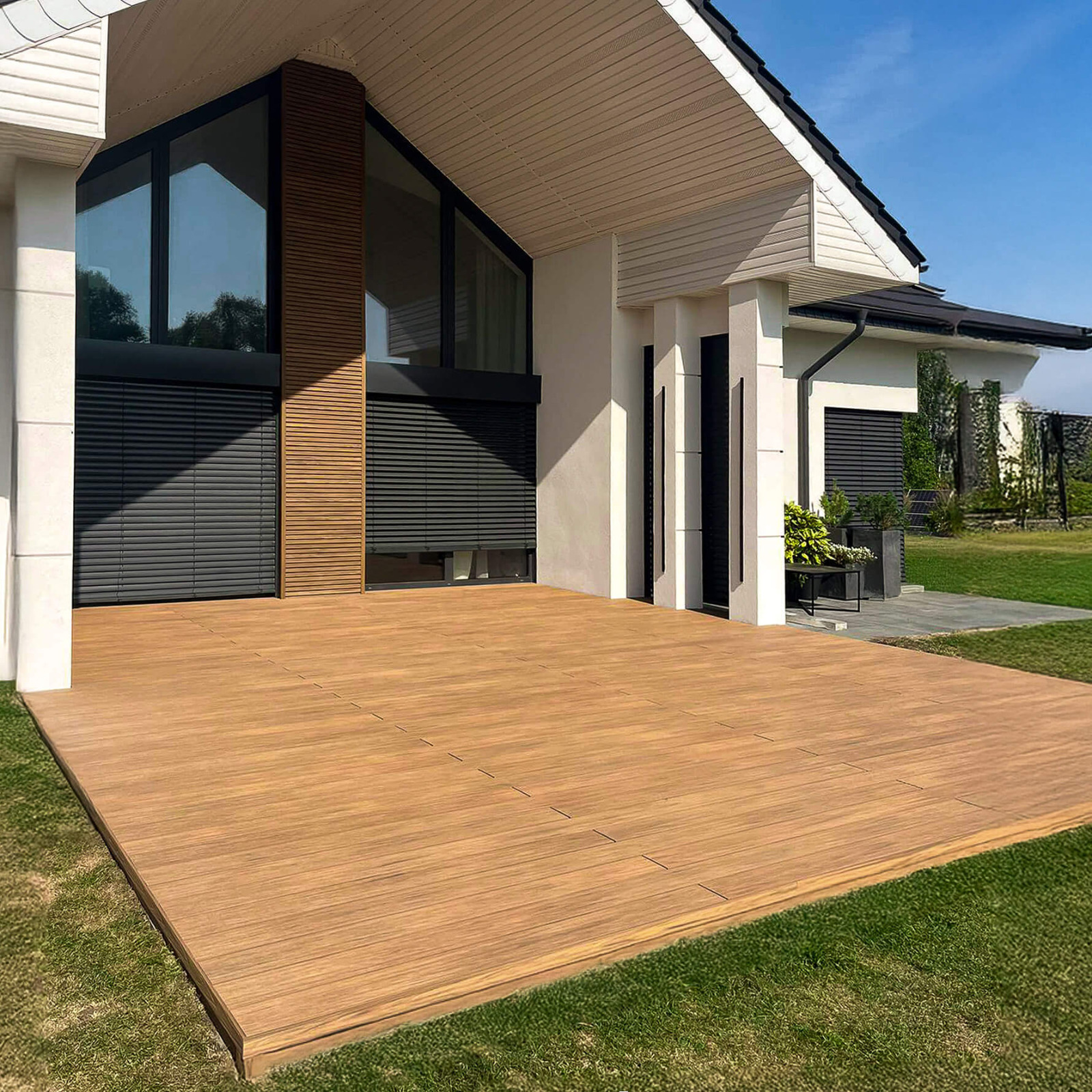 Terrasse und Fassade aus WPC-Dielen Winchester Oak – moderne stilistische Einheit